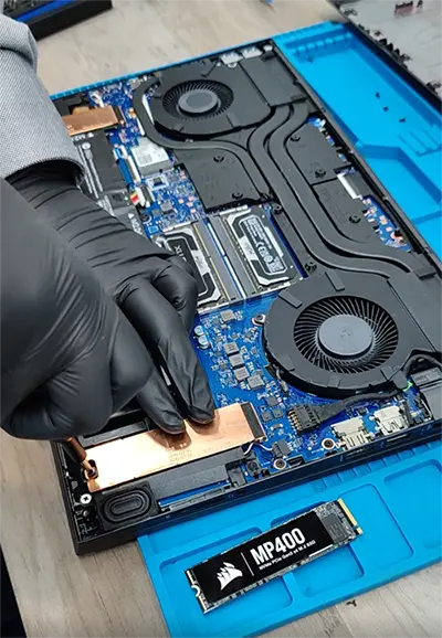 Image of a laptop being upgraded